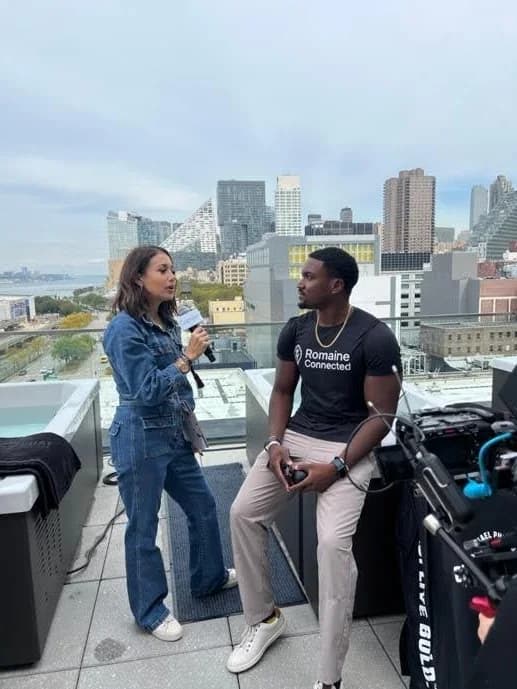 On-site interview at the Strong New York rooftop activation with the Manhattan skyline