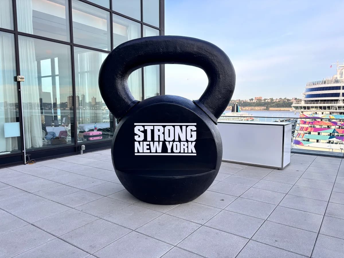 Strong New York branded kettlebell overlooking the Manhattan skyline