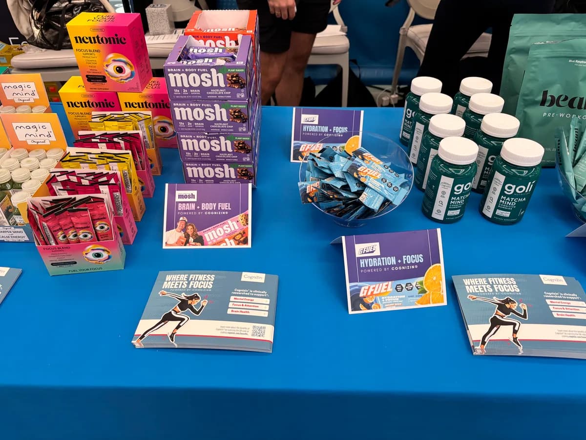 Cognizin Where Fitness Meets Focus product and sampling table