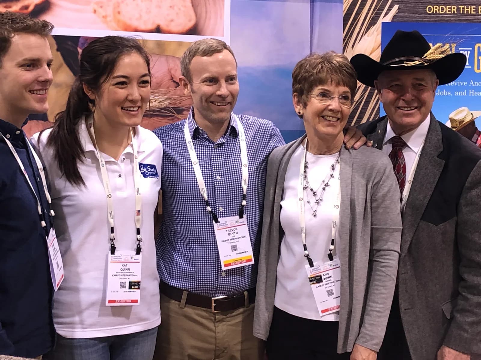 The Quinn family at the KAMUT® trade show booth promoting Grain by Grain