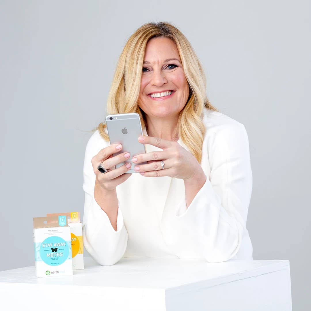 Kari Warberg Block, EarthKind founder, with her Stay Away product line